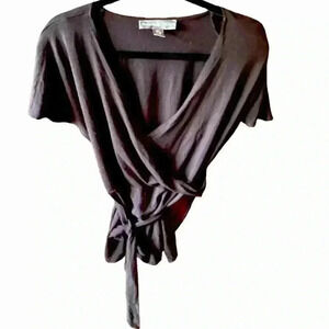 Josephine Chaus XL black surplice short sleeve wrap top. Attached belt . VGUC.